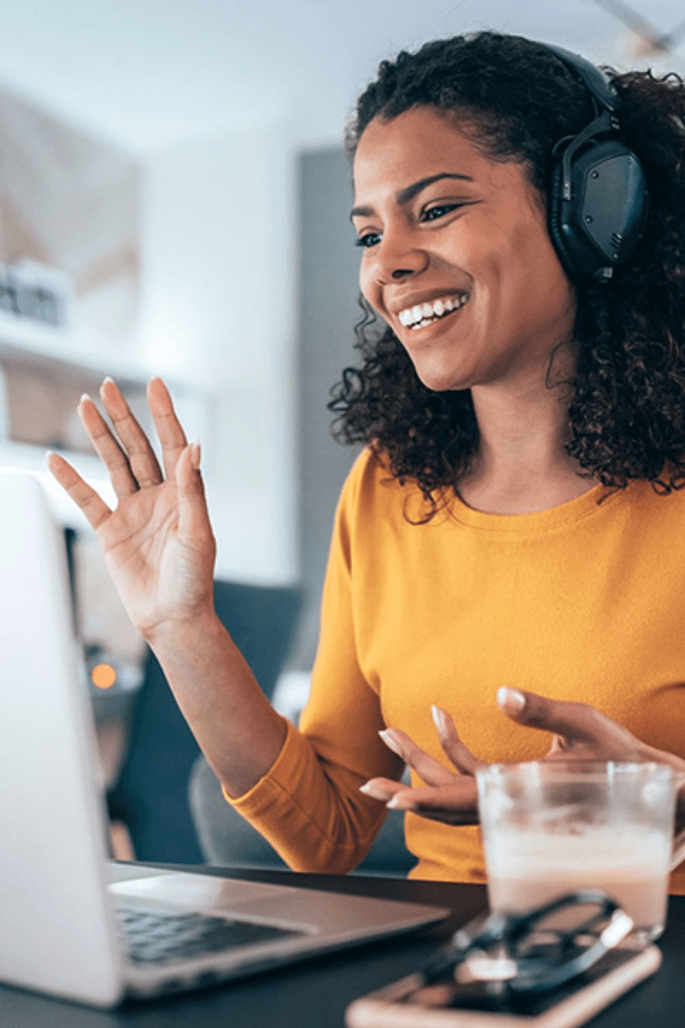 Dial & Acquire virtual assistant on a remote call, smiling mid-conversation